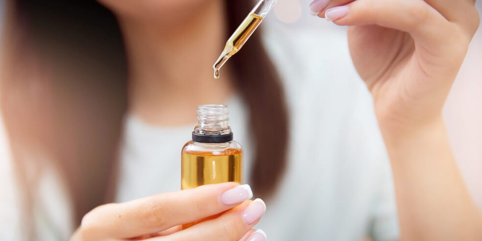 Woman using hemp seed oil