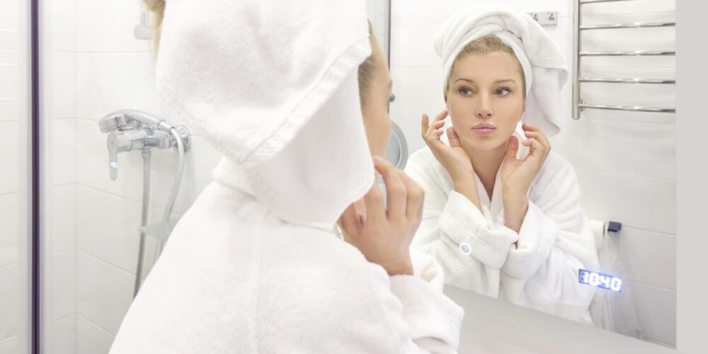 skin needs woman mirror skincare