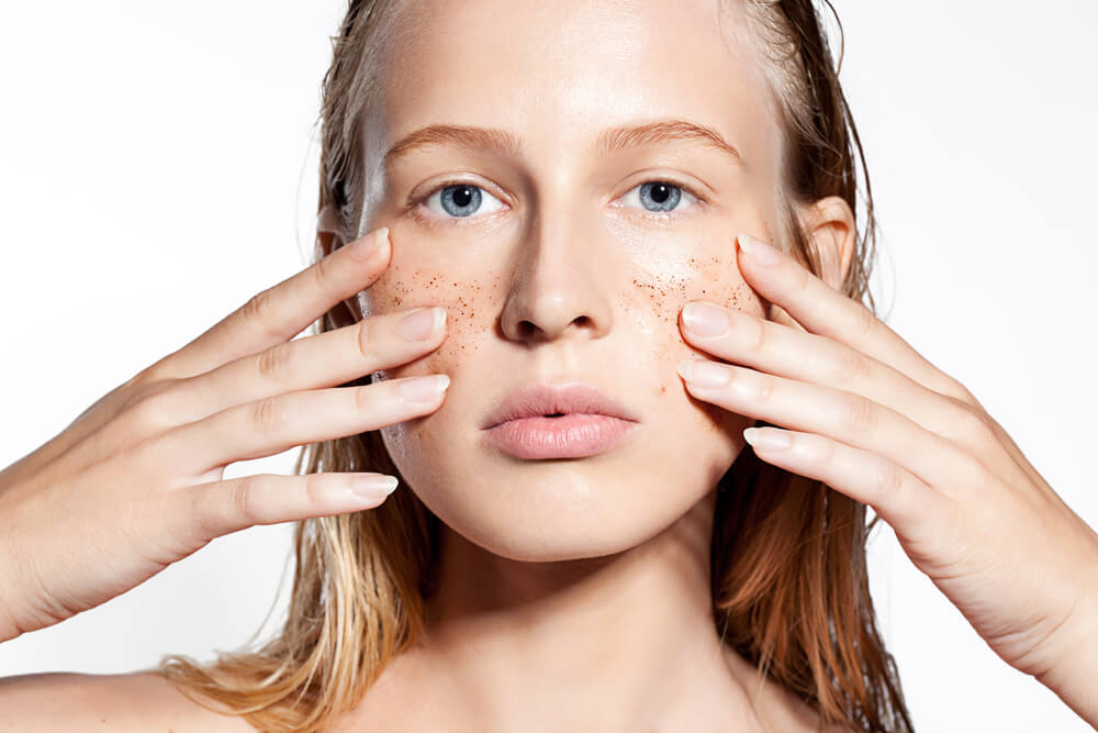 woman exfoliating
