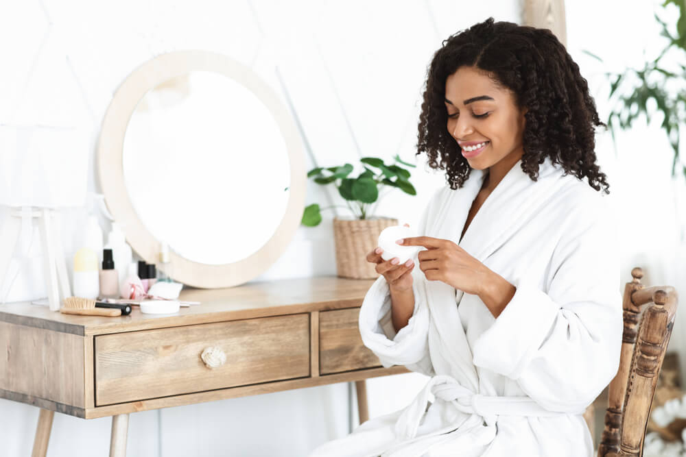 woman sitting bathrobe